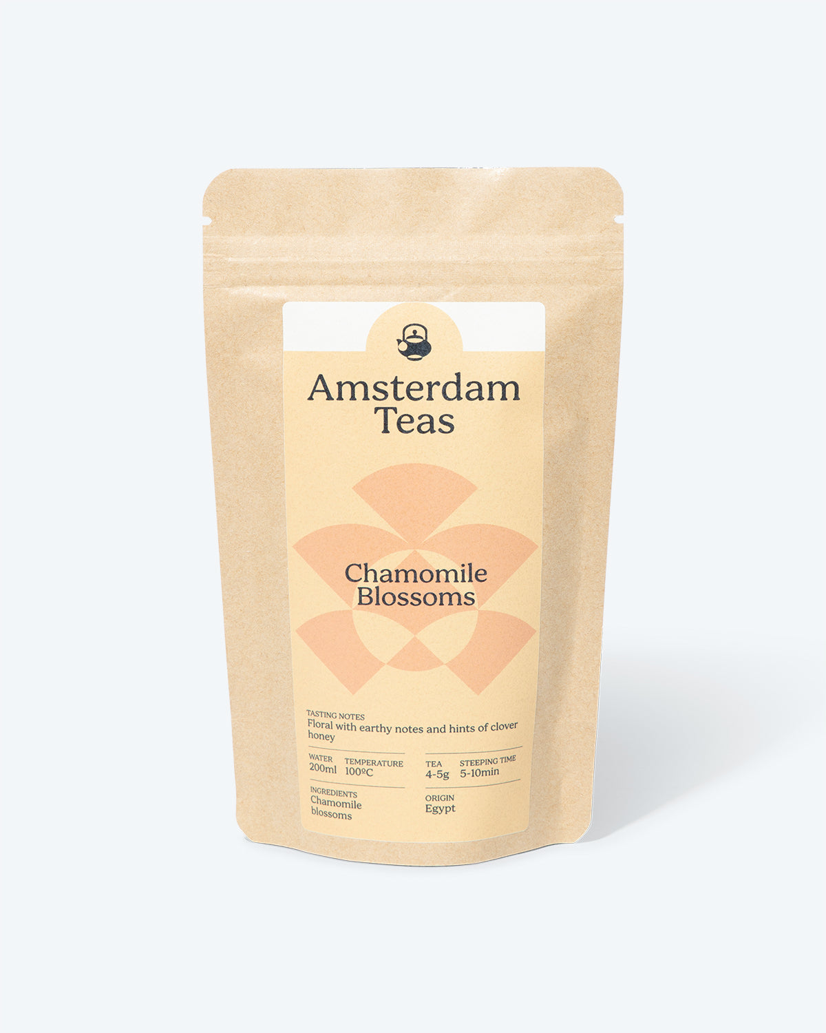 Our attractive packagine for Chamomile Blossom tea, with a label with pale orange pattern on light yellow field, including tasting notes, origin, and preparation instructions, on a brown, kraft paper bag with zip lock.